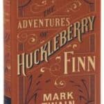 The Adventures of Huckleberry Finn by Mark Twain.